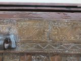 a close up of a wooden chest with a metal latch