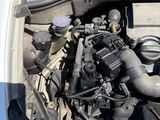 a car engine that is in the trunk of a car