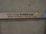 a close up of a piece of wood with writing on it
