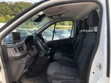 a white van with black seats in the back of it