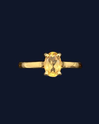 a yellow sapphire and diamond ring