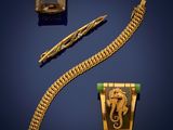 a gold bracelet, tie bar, and a watch on a blue background
