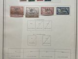 an old picture of a picture of a group of stamps on display