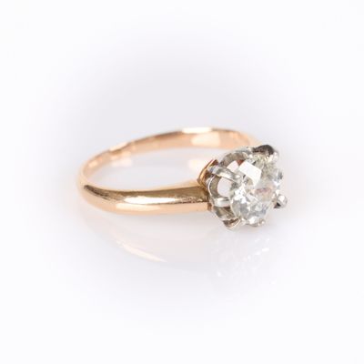 Bague solitaire en or de deux tons sertie d'un diamant taill… - Photo 1