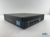 a close up of a small black computer on a white surface