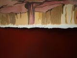 a picture of a painting on a wall with a red background