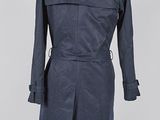 a blue trench coat on a mannequin mannequin mannequin mannequin mannequin mannequin mannequin mannequin manne