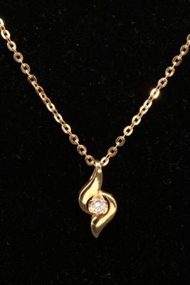 Ensemble formant collier en or jaune 18K (750°/00) comprenan…