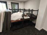an image of a room with a bed and a desk