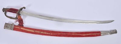 pair of red and silver swords on a white surface with a white background