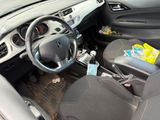 a car dashboard with a steering wheel and a dash board