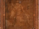 an old wooden frame with a painting of a woman on it