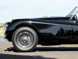 a black sports car parked on the side of the road