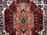 an oriental rug with a red and blue design on it