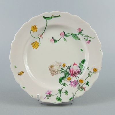 a white plate with a floral design on it