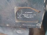 a close up of a metal box with a glass on it