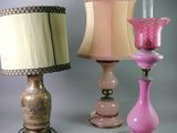 three lamps that are next to each other on a table