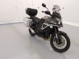 a motorcycle that is parked in a white room