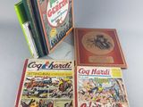 three comics are stacked on top of each other on a table
