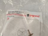 a small screw in a plastic bag on a table