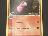 a card that has a picture of a purple and yellow object on it