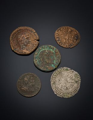 a group of five bronze coins