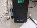 a machine that is sitting on the ground next to other items