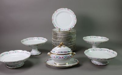 a lot of plates and bowls on the table