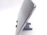 a close up of a tablet computer on a stand