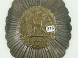an image of a badge with a bird on it