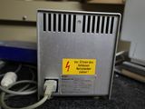 an image of a power supply unit with a power cord plugged into it