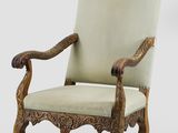 an image of a chair with a green upholstered seat and arms