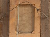 a picture of a wooden frame with wires attached to it