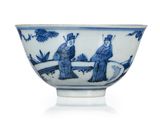 a blue and white bowl with a picture of a man and a woman on it