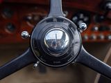 a close up of a steering wheel and dashboard of a car