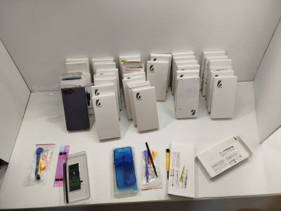 a lot of electronic devices that are sitting on a table