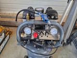 an image of a compressor with gauges and gauges on it