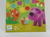 the little circuit board game has a purple dog and a cat on it