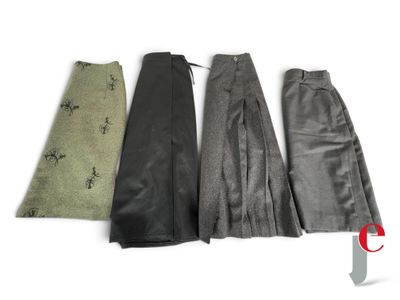 three pairs of black and grey pants and a pair of green and black gloves