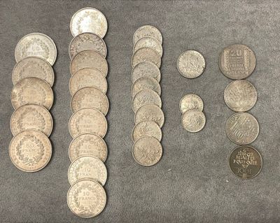 a lot of coins that are sitting on a table