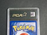 an image of a pokemon card in a plastic case