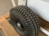 a wheel on a pallet that is sitting on a pallet