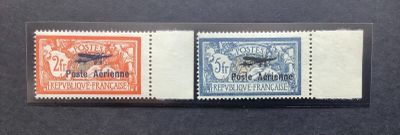 two stamps with a picture of a man and a woman on them