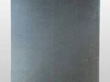 a book with a black cover sitting on top of a table