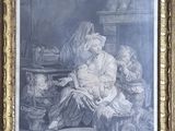 an old picture of a woman sitting on a chair with a child
