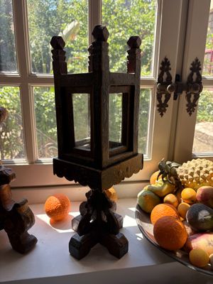 many different types of fruit on the table by the window