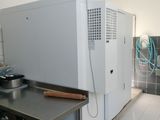 an image of a kitchen with a refrigerator and a sink