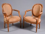 pair of louis xvi style carved wood armchairs