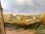 un tableau représentant un homme avec un mouton et un chien dans un champ