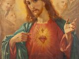 an oil painting of jesus holding a sacred heart surrounded by angels